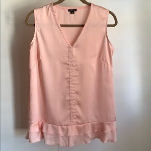 Women’s V-Neck Sleeveless Blouse with Ruffle Hem